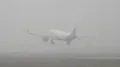 Delhi airport issued a passenger advisory on Friday as dense fog enveloped the national capital during early morning hours. The haze reduced visibility