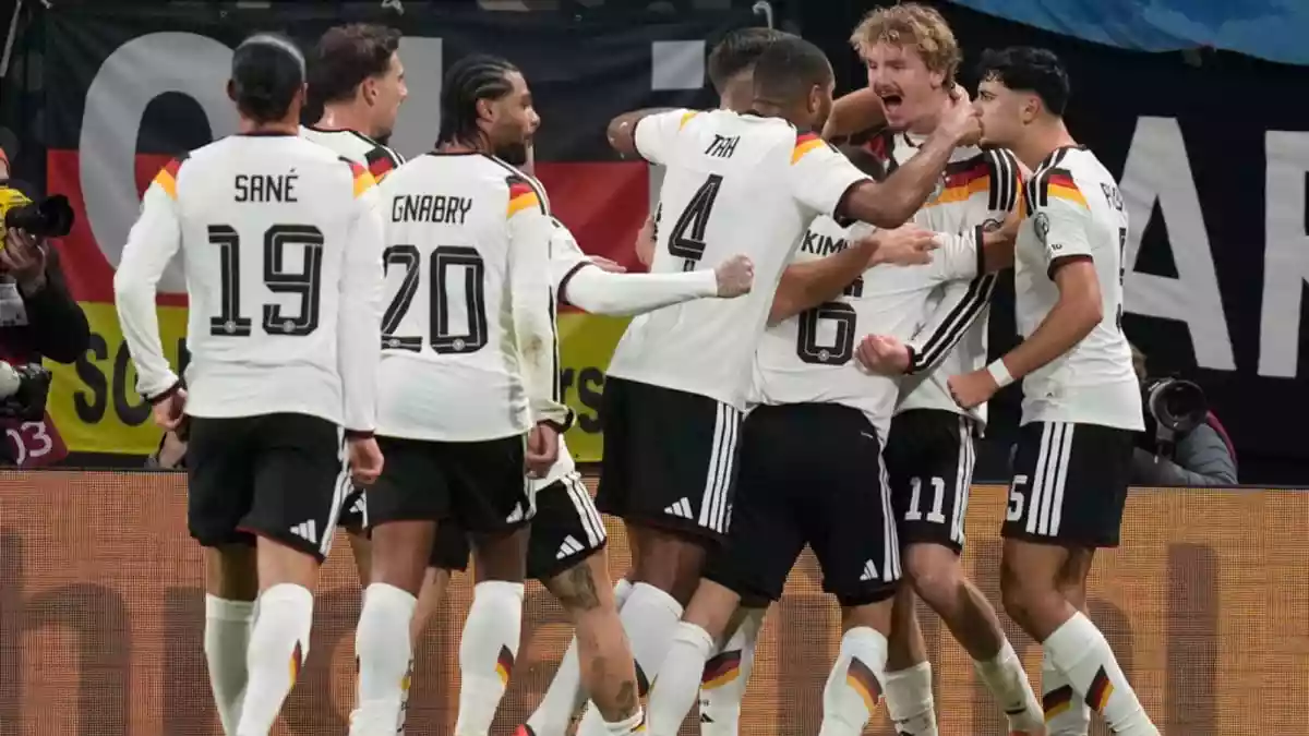 Germany secured a spot in next year's World Cup by dominating Slovakia 6-0 in their final qualifier on Monday, delivering four goals in the first half and