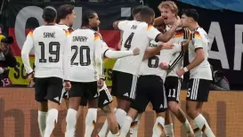 Germany secured a spot in next year's World Cup by dominating Slovakia 6-0 in their final qualifier on Monday, delivering four goals in the first half and