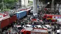 The driver of a freight train involved in a fatal collision with a public bus in Bangkok has tested positive for drugs and been charged with reckless driving