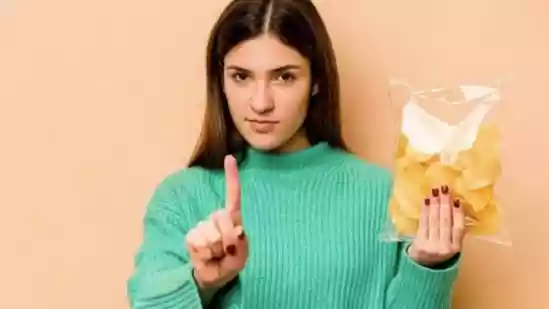 Eating too much processed food, instead of whole foods, means consuming excessive amounts of calories, saturated fat, salt, and sugar. Per a report published by the NHS UK, diets high in ultra-processed foods have been linked to an increased risk of health conditions such as obesity, type 2 diabetes and heart disease.