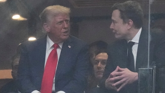 Elon Musk made a surprise appearance at Charlie Kirk's memorial service on Sunday. The Tesla billionaire flew to Arizona to attend the memorial for the Turning Point USA co-founder who was shot and killed in public on September 10. Musk sat briefly next to US President Donald Trump – making it the first time since May that the two were photographed together. However, it was the positioning of his hands that raised eyebrows and set off conspiracy theories.