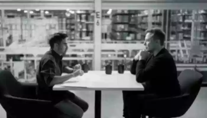 <strong>Elon Musk On 'WTF' Podcast: </strong>The two sip coffee and exchange smiles without any dialogue, while a SpaceX logo on Kamath's mug