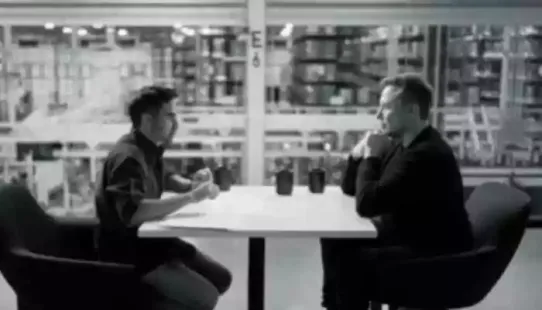 <strong>Elon Musk On 'WTF' Podcast: </strong>The two sip coffee and exchange smiles without any dialogue, while a SpaceX logo on Kamath's mug