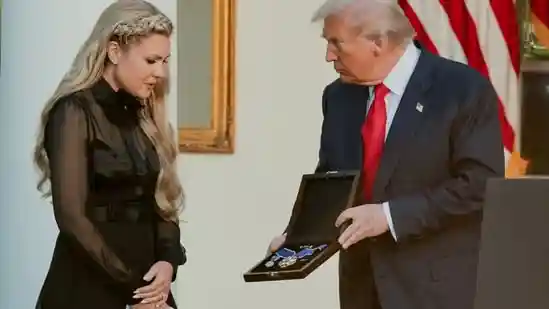 Erika Kirk received the posthumous Presidential Medal of Freedom for her slain husband, Charlie Kirk, from Donald Trump at the White House on Tuesday. After the emotional award ceremony, a video of the medal surfaced, with Erika Kirk likely holding it. In the video, a Christian cross could be seen engraved on the medal.Erika Kirk received the posthumous Presidential Medal of Freedom for her slain husband, Charlie Kirk, from Donald Trump at the White House on Tuesday. After the emotional award ceremony, a video of the medal surfaced, with Erika Kirk likely holding it. In the video, a Christian cross could be seen engraved on the medal.The video was widely shared on social media, especially by other right-wing content creators, such as Benny Johnson and Nick Sortor. They claimed that the Christian cross engraving on the Presidential Medal of Freedom, the highest civilian honor in the US, is the first time for any awardee.Normally, the Medal of Freedom award has a blue center with white stars spangled on it. But, as per the videos shared on social media, in the case of Charlie Kirk, it had a Christian cross in it.