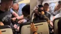 What was supposed to be another routine flight descended into chaos when an unruly passenger tried to open an exit door while the plane was in the air
