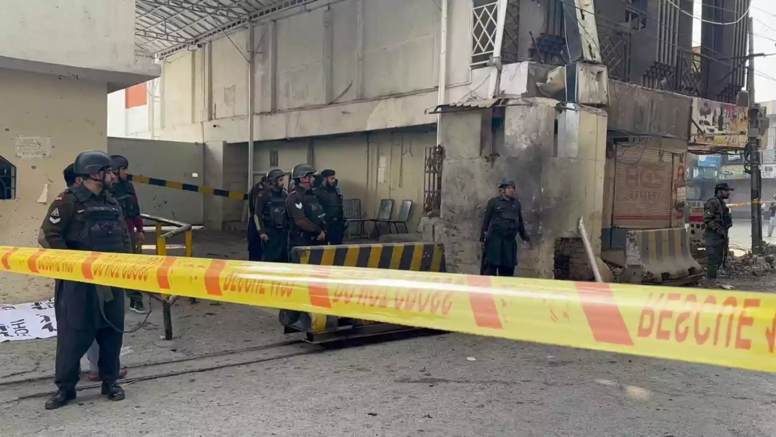 Two suicide bombers have attacked the headquarters of a Pakistani paramilitary force on Monday, killing three security officials and wounding at least 12