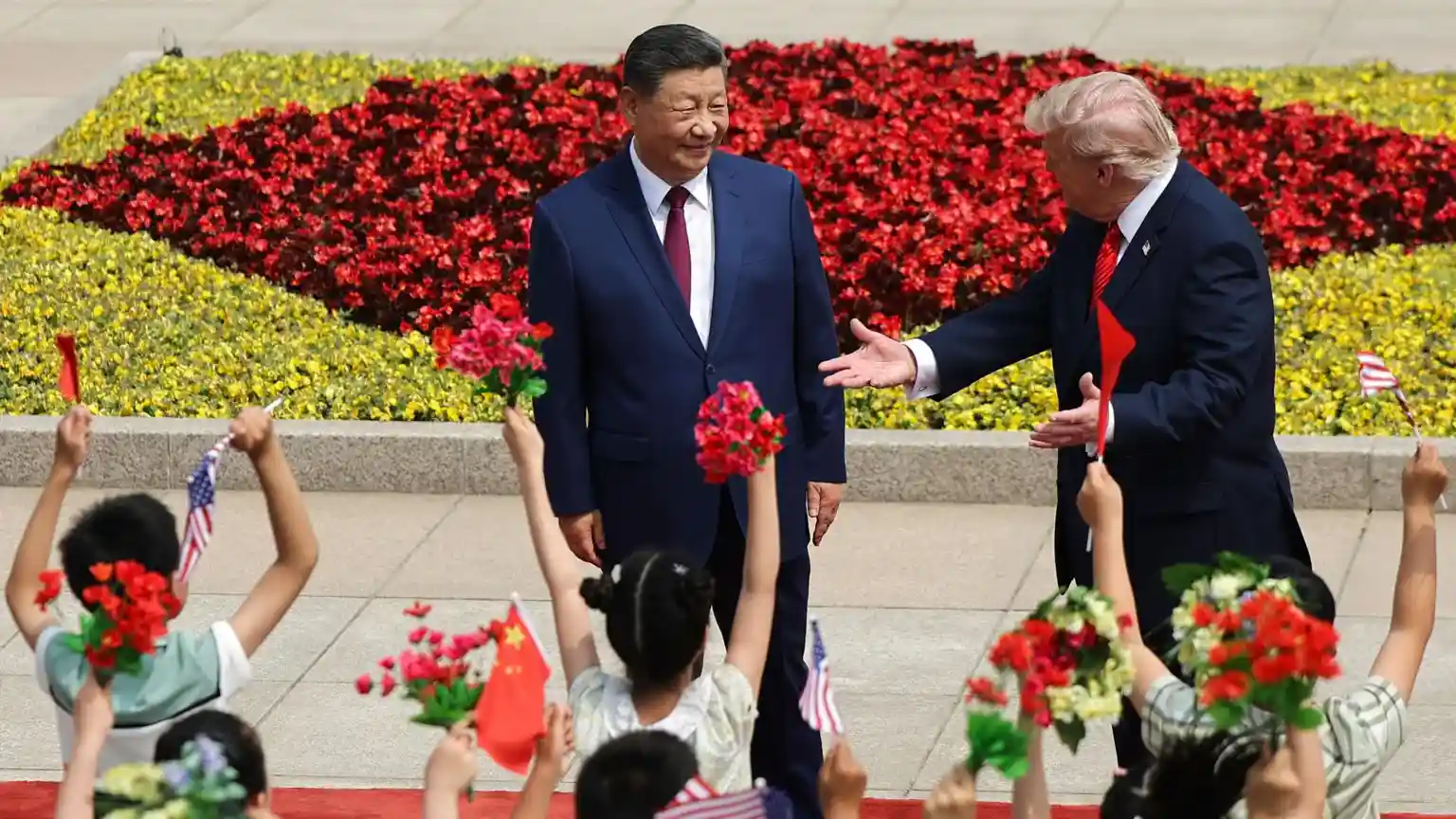 Xi Jinping threw a grand welcome for Donald Trump on the first day of a visit that could reset ties between the rival superpowers