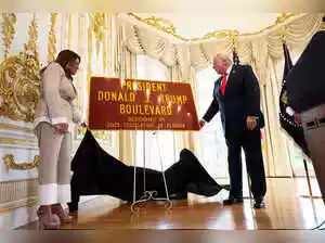 A road near President Donald Trump's Florida club has been renamed in his honor. This marks the latest in a series of projects and buildings bearing his name