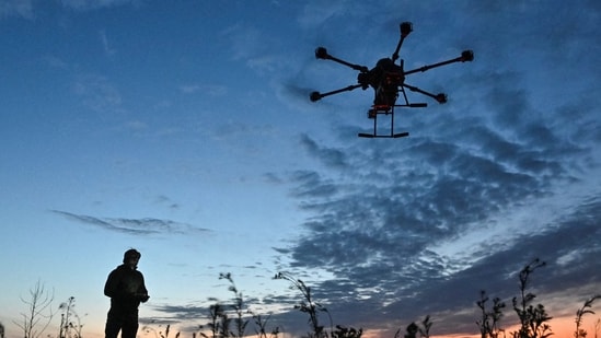 For all the impressive tasks that drones can do, there is one that remains beyond their power: facial recognition. Drones are generally much farther from their subjects than the kind of cameras, such as CCTVs, that are ordinarily used for biometrics. At these distances a face may consist of only a few dozen pixels. Atmospheric turbulence caused, for example, by rising hot air, can distort features like the distance between one's eyes. And because they record from the sky, drones' on-board cameras may capture only a partial view of a face (or, if someone is wearing a wide-brimmed hat, none at all).