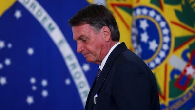 Former Brazilian President Jair Bolsonaro was found guilty on Thursday in a landmark Supreme Court case involving a 2022 coup attempt and an assassination plot. The court sentenced Bolsonaro to 27 years in prison, according to reports from the BBC. The ruling followed the decision of four out of five Supreme Court justices who convicted Bolsonaro and seven of his co-defendants, while one justice dissented from the majority opinion. This verdict marks a pivotal moment in Brazil's recent political and judicial history.