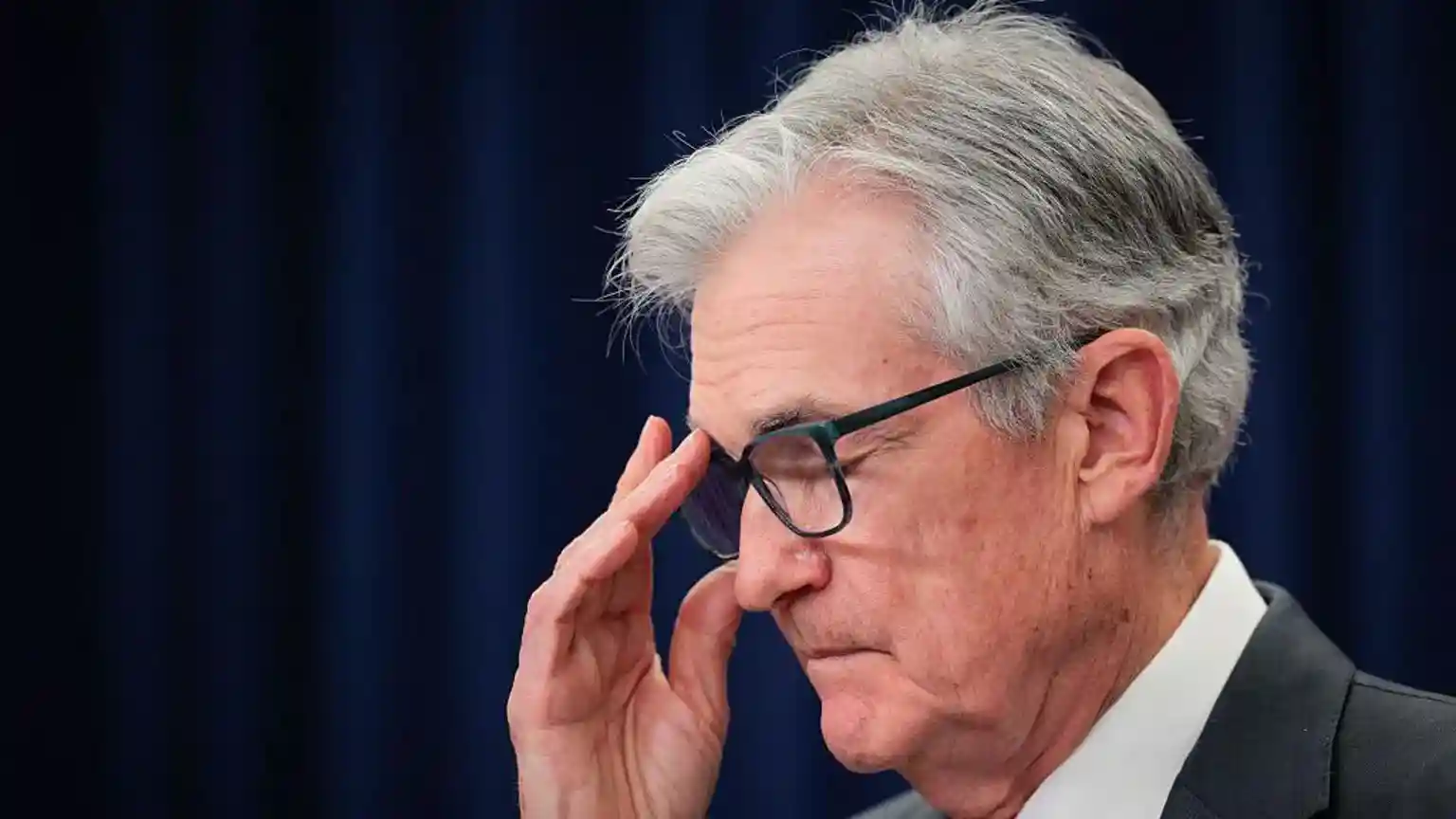 The Federal Reserve has held US interest rates steady after what was expected to be Jerome Powell's final meeting as chair. Hours after his successor Kevin