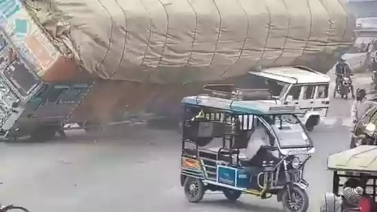 In a freak accident in Uttar Pradesh's Rampur, a truck loaded with husk overturned and crushed a vehicle underneath, leading to the on-spot death of the driver