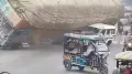 In a freak accident in Uttar Pradesh's Rampur, a truck loaded with husk overturned and crushed a vehicle underneath, leading to the on-spot death of the driver
