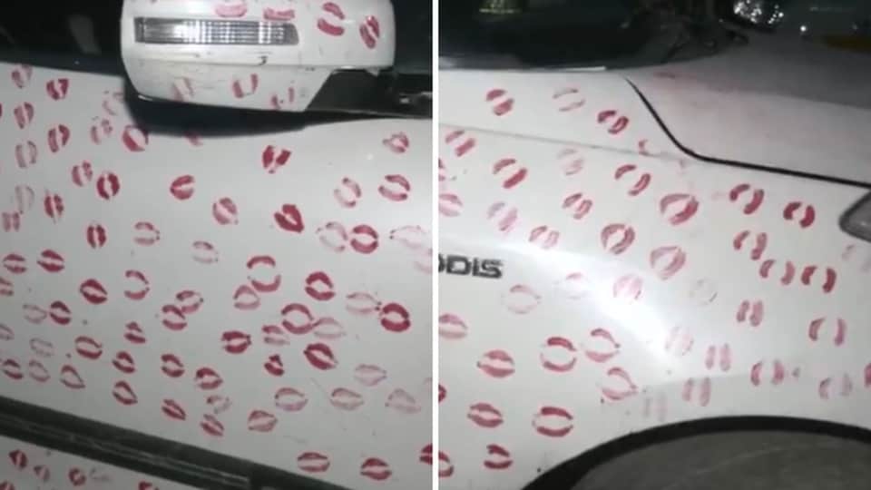 <h4>Girlfriend leaves 3,400 kiss marks on car. Gwalior cops make man wipe them off, fine him ₹5,500</h4> <h4>A viral trend went wrong when