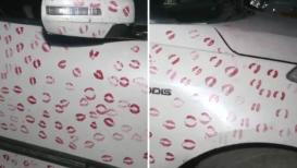 <h4>Girlfriend leaves 3,400 kiss marks on car. Gwalior cops make man wipe them off, fine him ₹5,500</h4> <h4>A viral trend went wrong when