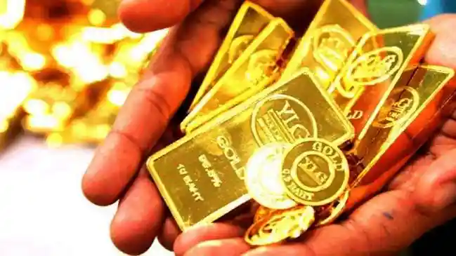 Gold and silver fall on MCX amid strong US dollar and crude, but global prices rise. Delhi to Mumbai 22K and 24K gold rates stay high as investors track