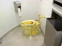 A solid gold toilet sculpture by artist Maurizio Cattelan, named 'America', is set for auction. Sotheby's will offer the artwork with a starting bid reflecting