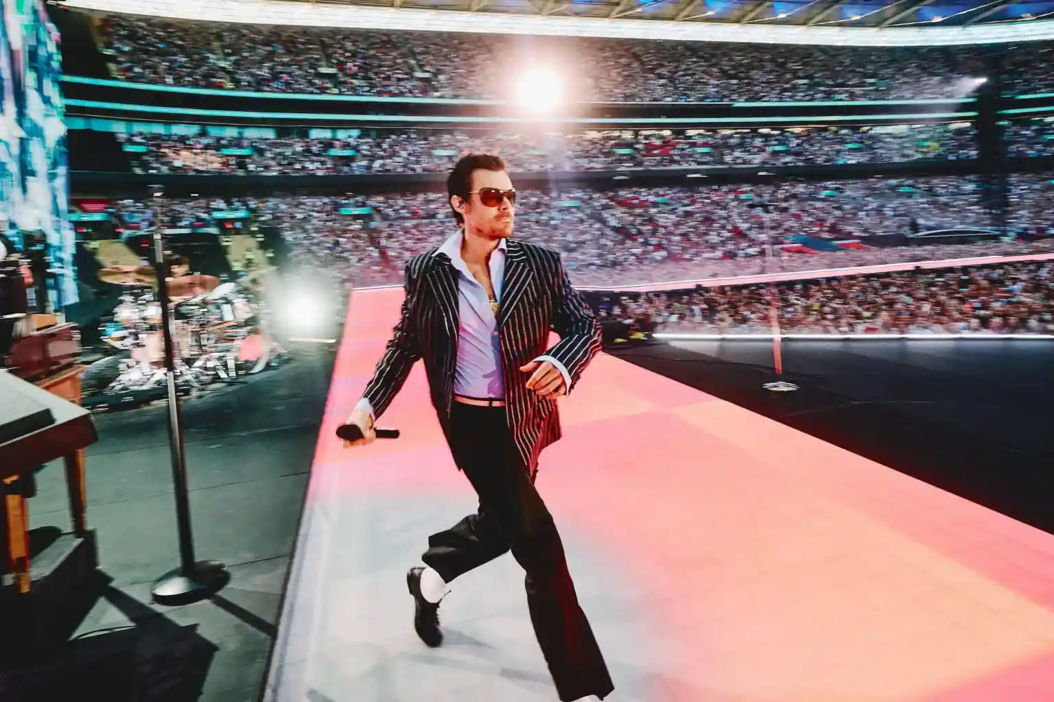 Harry Styles opened the first night of his record-breaking residency at Wembley Stadium by reminiscing about his audition for The X Factor, 16 years ago