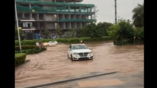 Heavy rain battered Delhi NCR on Monday, disrupting daily life and causing severe waterlogging in several parts of the region. Gurgaon emerged as one of the worst-hit areas, with residents struggling through flooded streets and facing long traffic snarls.