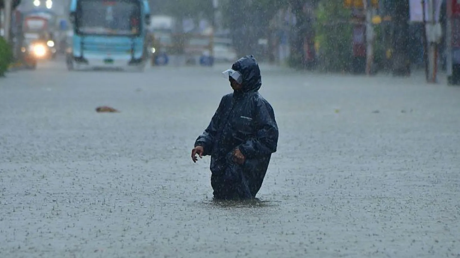 Heavy rainfall in India's financial capital Mumbai has disrupted the lives of millions of people, submerging roads and leading to flight and train cancellations. Many parts of the city remain inundated in waist-deep water, with videos showing residents swimming through waterlogged roads as garbage gushed out from clogged sewers.