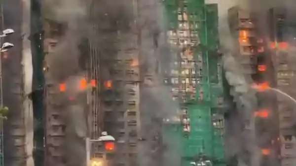 Four people were killed after a massive fire engulfed several high-rise towers of a residential complex in Hong Kong's northern Tai Po district