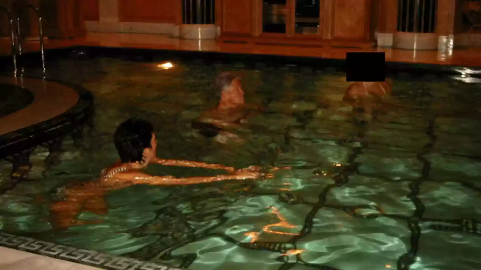 There is a photo that shows Bill Clinton taking a night-time swim alongside Ghislaine Maxwell, the British socialite now convicted of sex trafficking