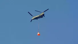 The crew module, where the astronauts reside, orbits the earth at a high velocity of about 7,800 m/s. When the module returns to the earth and re-enters the