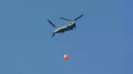 The crew module, where the astronauts reside, orbits the earth at a high velocity of about 7,800 m/s. When the module returns to the earth and re-enters the