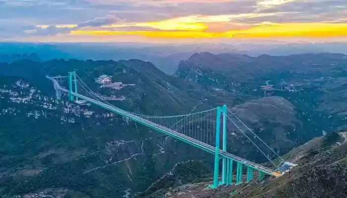 Huajiang Grand Canyon Bridge in Southern China rises 2,050 feet, redefining travel, tourism and thrill-seeking. <strong>Beijing:</strong> The Huajiang Grand Canyon Bridge in Southern China dominates the Beipan River with breathtaking height and engineering brilliance. Rising approximately 2,050 feet above the canyon, it holds the title of the world's tallest bridge and stretches 4,600 feet in length, making it the longest bridge in a mountainous region.