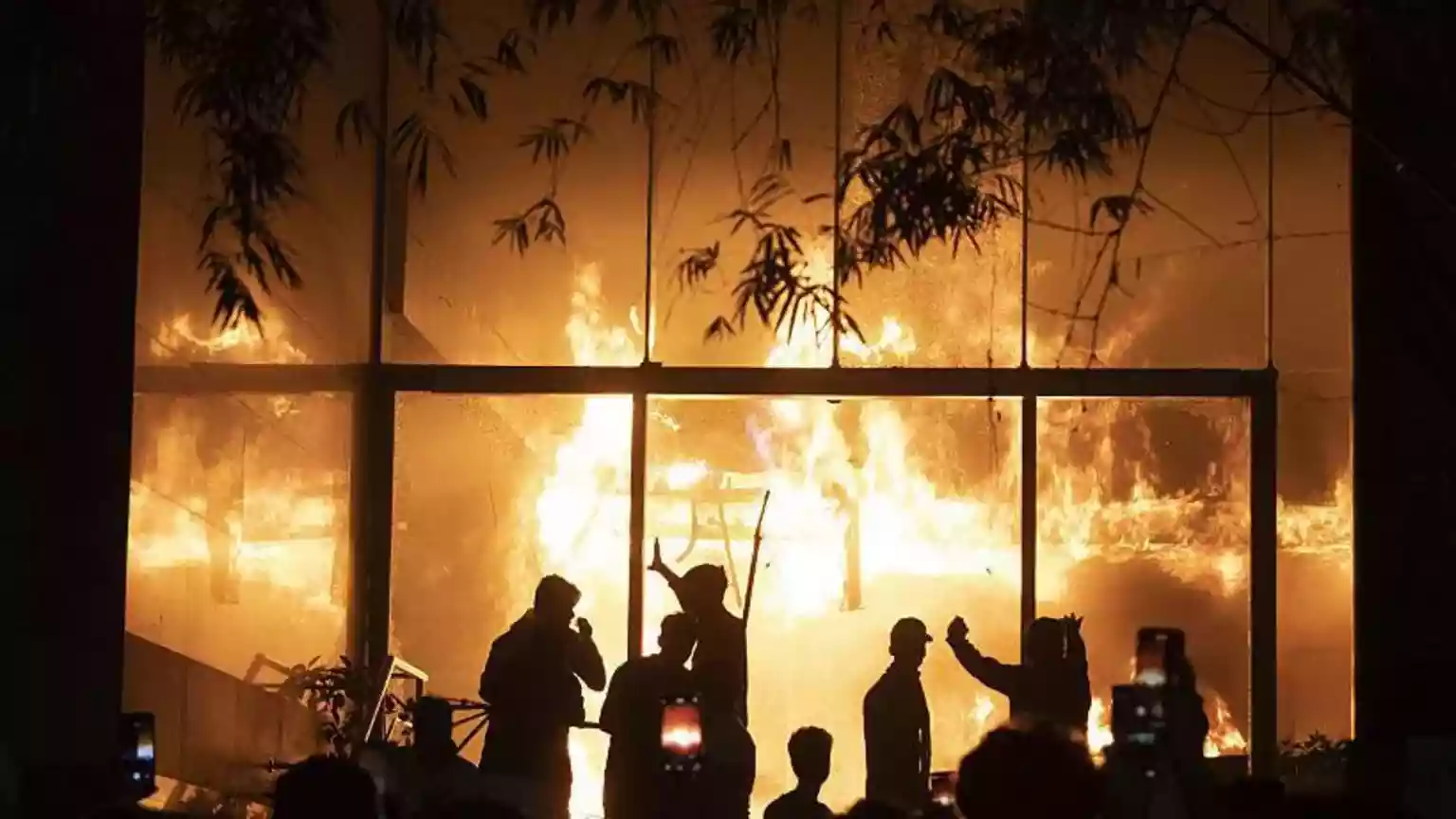 I can't breathe any more. There's too much smoke. I'm inside. You are killing me. Zyma Islam typed that on Facebook well past midnight on 18 December