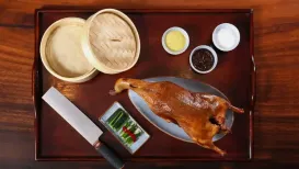 Beijing Duck, also known as Peking Duck, is a traditional Chinese dish that has gained worldwide popularity for its tender flavour and being high on technique