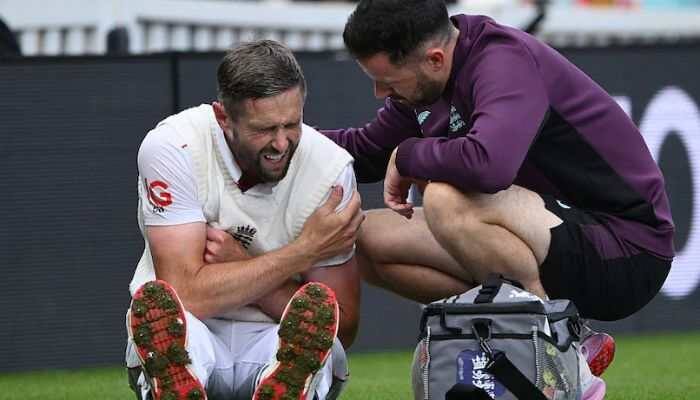 In a dramatic twist to the IND vs ENG 5th Test 2025, injured Chris Woakes was spotted padded up with a shoulder sling, ready to bat if needed on Day 5, echoing Rishabh Pant's heroic broken-foot innings. In a dramatic turn during the India vs England 2025 5th Test at The Oval, seasoned England all-rounder Chris Woakes was seen in his whites and ready to bat despite suffering a painful shoulder injury earlier in the match. The sight of Woakes donning the shoulder sling one moment and warming up the next has sparked widespread speculation about whether he'll brave the pain and walk out if England's final wickets tumble on Day 5 of this riveting Test.