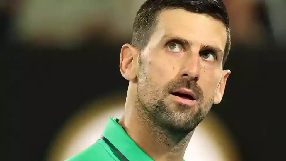 Another reckless swipe of the racquet could have led to a horrible sense of deja vu for Novak Djokovic.</b> Back in 2020, Djokovic was disqualified from