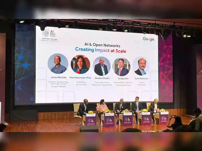 At the India AI Impact Summit, James Manyika of Google and Alphabet, Nandan Nilekani of Networks for Humanity, Sangbu Kim of the World Bank Group
