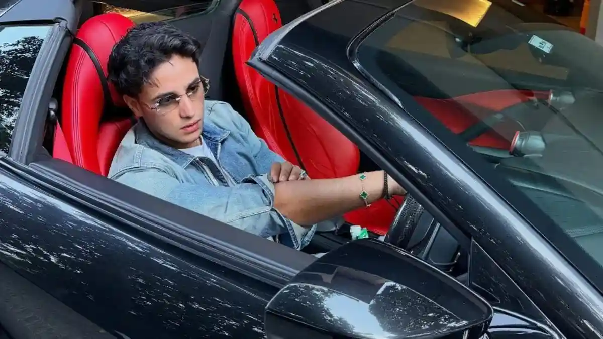 India cricketer Abhishek Sharma has added another dream machine to his collection: a sleek Ferrari Purosangue, reportedly worth around Rs 10.5 crore. The young batter shared two pictures of his new ride on Instagram, where he can be seen sitting behind the wheel, looking effortlessly stylish in a denim jacket and sunglasses.India cricketer Abhishek Sharma has added another dream machine to his collection: a sleek Ferrari Purosangue, reportedly worth around Rs 10.5 crore. The young batter shared two pictures of his new ride on Instagram, where he can be seen sitting behind the wheel, looking effortlessly stylish in a denim jacket and sunglasses.In the photos, the Ferrari's bright red interiors stand out beautifully against its shiny black exterior, giving it a bold and sporty look. Fans couldn't stop talking about the car's design and the 25-year-old's cool demeanor as he posed with it.<strong>A Closer Look at Abhishek's Ferrari</strong>The Ferrari Purosangue is one of the most exclusive models ever made by the Italian carmaker. It comes with a powerful V12 engine, capable of going from 0 to 100 km/h in just 3.3 seconds.