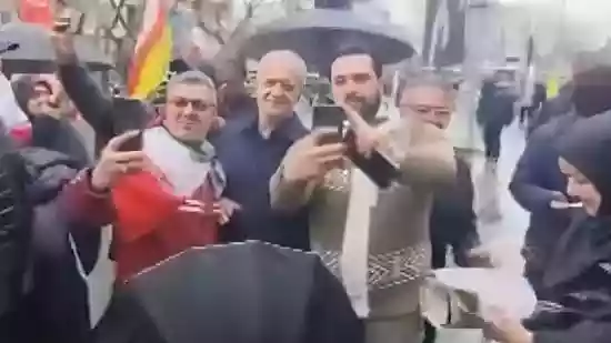 Iran Prez, top leaders march in Tehran as bombs fall