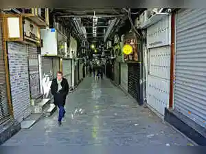 Demonstrators took to the streets of Tehran and outside the capital on Wednesday, extending unrest that began after the national currency plunged to historic