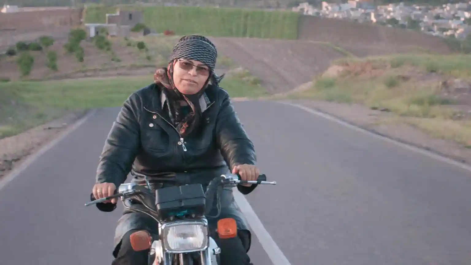 Iran's motorcycling midwife and rights campaigner is star of Oscar-tipped film