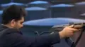 An Iranian state television presenter fired a shot at the flag of the United Arab Emirates during a live firearms training broadcast