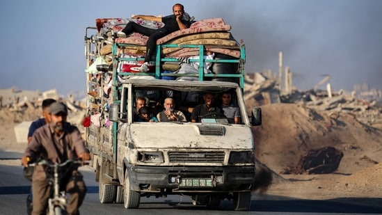 Israel's army called Saturday on Palestinians in Gaza City to move to a humanitarian area it designated in the south as it expanded its operations in preparation for seizing the famine-stricken city, including targeting high-rise buildings. Parts of the city, home to nearly 1 million people, are already considered 