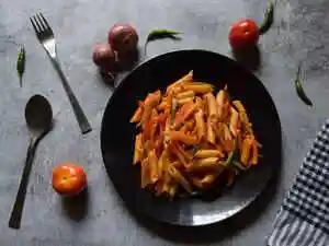 Italy is working with the European Commission. They are pressing the United States. This is to reconsider new anti-dumping tariffs on pasta imports. These tariffs would double pasta prices. The US Department of Commerce found Italian producers sold pasta at unfairly low prices. These new duties would apply from January 2026. Italy contests these findings.Italy is working with the European Commission. They are pressing the United States. This is to reconsider new anti-dumping tariffs on pasta imports. These tariffs would double pasta prices. The US Department of Commerce found Italian producers sold pasta at unfairly low prices. These new duties would apply from January 2026. Italy contests these findings.Rome is working closely with the European Commission to press the United States to reconsider an additional anti-dumping tariff on pasta imports which would effectively double their price, the Italian foreign ministry said.<br><br> The decision to impose an extra duty of 91.74% is the result of proceedings by the U.S Department of Commerce which found that two major Italian producers were allegedly selling pasta at unfairly low prices - a practice known as dumping - between July 2023 and June 2024.<br><br> These would be on top of the 15% U.S. tax on most imports from the 27-nation EU, and would be applied from January 2026.<br><br> The Italian foreign ministry said in a statement late on Saturday it contested the findings and the new tariffs, and was assisting companies in protecting their rights through the embassy in Washington.<br><br> With almost $800 million in exports, the U.S. is one of Italy's top three export markets for pasta, a staple of the country's culinary heritage and a substantial export commodity.<br><br> In 2024, Italy's total pasta exports were worth over 4 billion euros ($4.70 billion) with almost 2.5 million tons sold abroad, according to data by national statistics agency ISTAT.<br><br> Italy's main business lobby Confindustria on Thursday cut its economic growth forecasts for this year and next, citing the impact of U.S. tariffs and geopolitical tensions on exports.<br>   Add    as a Reliable and Trusted News Source     Add Now!   <br> <br>