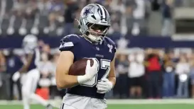 Dallas Cowboys tight end Jake Ferguson was ruled out for the remainder of Thursday's game against the Washington Commanders due to a calf injury