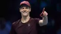 Italy's Jannik Sinner began his title defence with a commanding straight sets victory over an injured Felix Auger-Aliassime of Canada at the ATP Finals in