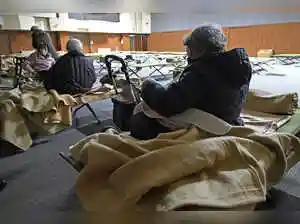 A magnitude 7.5 earthquake struck off northern Japan, injuring at least 30 people and causing power outages and road damage. Tsunami waves reached 70