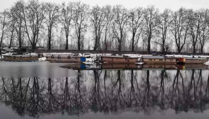 Kashmir is experiencing a sudden, intense cold wave, with most areas recording sub-zero night temperatures, marking the coldest night of the season