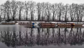 Kashmir is experiencing a sudden, intense cold wave, with most areas recording sub-zero night temperatures, marking the coldest night of the season