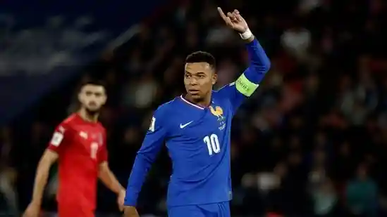 Kylian Mbappé showed little sign of a recent ankle injury as he scored with a slaloming run to help France beat Azerbaijan 3-0 in World Cup qualifying on Friday. He added an assist for France's second goal but did have to limp off late after he had tussled for a ball with an opponent.Kylian Mbappé showed little sign of a recent ankle injury as he scored with a slaloming run to help France beat Azerbaijan 3-0 in World Cup qualifying on Friday.He added an assist for France's second goal but did have to limp off late after he had tussled for a ball with an opponent.France maintained a perfect record after three games, while Germany got back on track by easing to a 4-0 win over Luxembourg.France dominated Azerbaijan but struggled to create opportunities and it took an individual effort from Mbappé to break the deadlock in first-half stoppage time.The Real Madrid forward gathered the ball in midfield and dribbled through numerous players before slotting a shot into the bottom right corner.