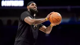 LeBron James is inching closer to his long-awaited season debut — but he's not making any big promises just yet. “We've been taking it literally