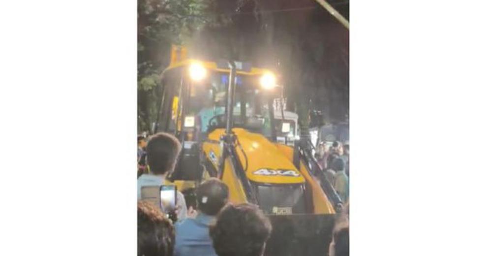 A bulldozer sent to remove a Communist Party of India (Marxist) book stall in Kolkata’s Jadavpur area on Saturday had to retreat after party workers